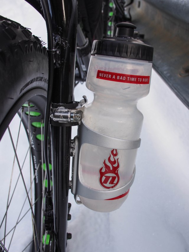 Pipe clamp, rubber bumper, and inner tube standard bottle mount.