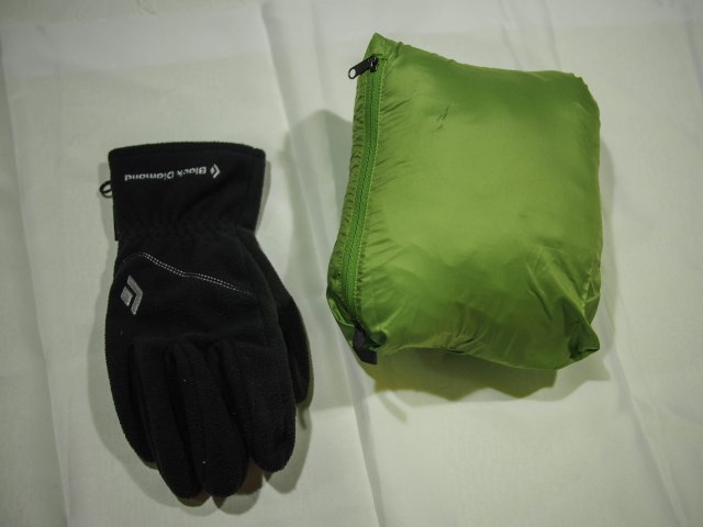 It stuffs into its own inner chest pocket.