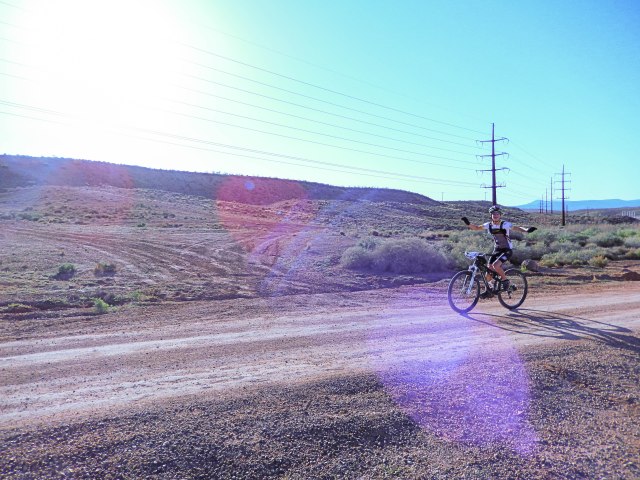 Goat Boy on a skinny-tired sissy bike.
