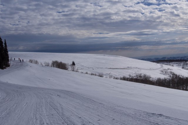 You can see riders in photo-center in the distance.