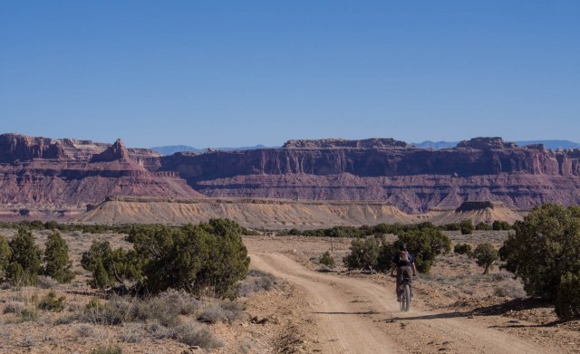 San Rafael Swell and the San Rafael River canyon in the distance.