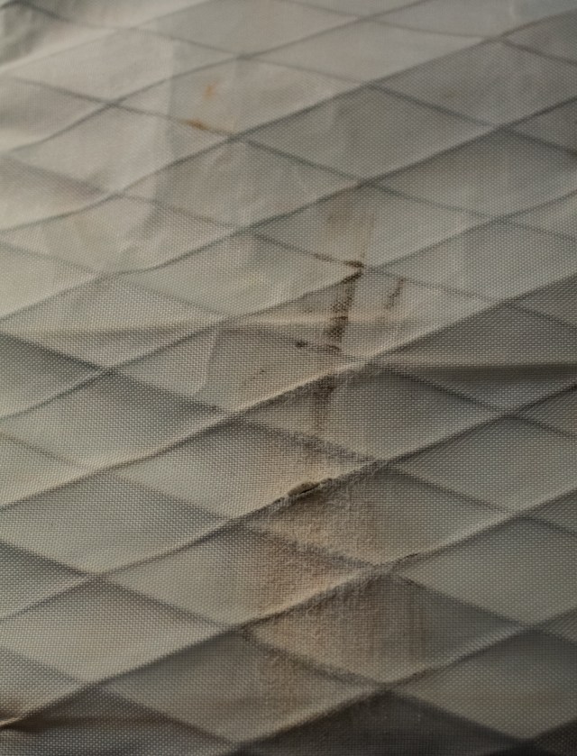 Wear on the underside of the pack wear it occasionally rubbed on the back tire.